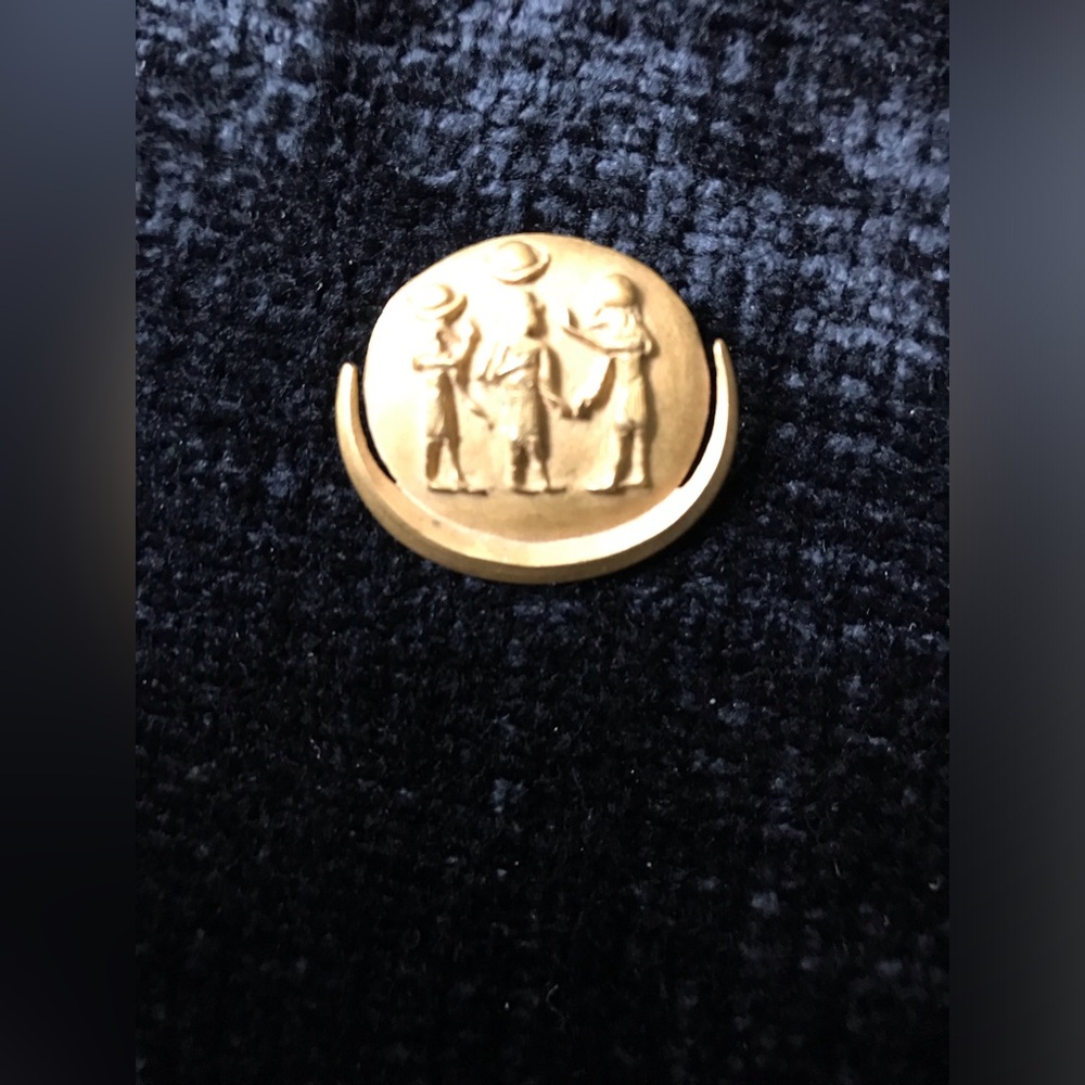 Vintage 1976 brass pendent from MMA